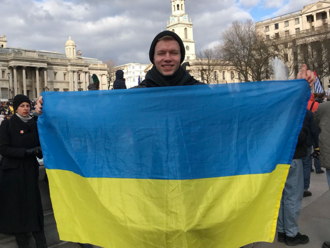 ‌Tom at a protest in London.